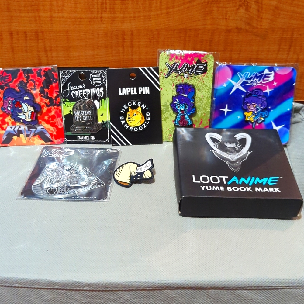 NWOT Meme pins and assorted yume merch; pins and a bookmark